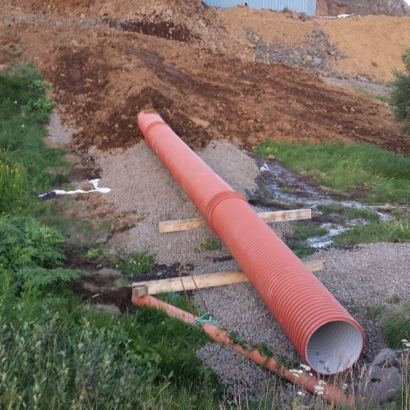 fráveita frá sandgildru komið fyrir